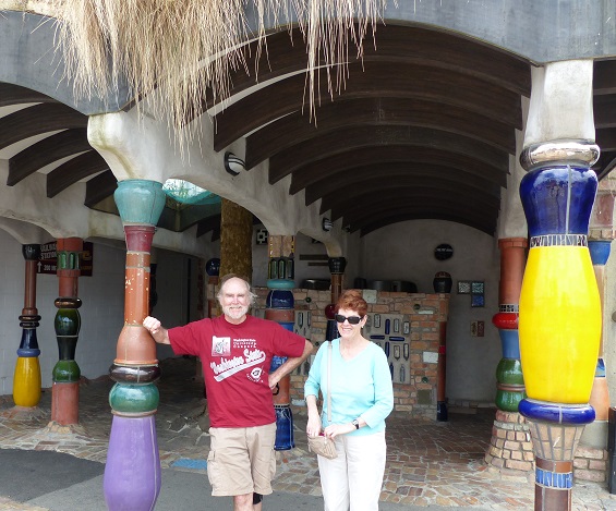 Randall and Martha at the Hundertwasser public toilets in Kawakawa